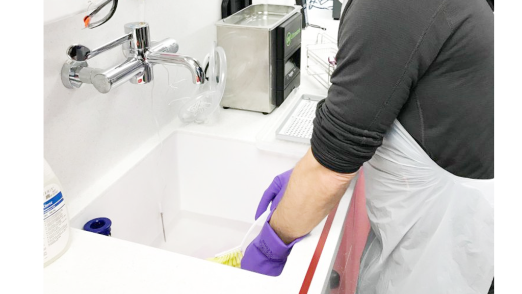 Manual cleaning of dental instruments